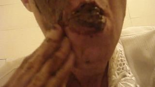 eating scat and smearing it over my face