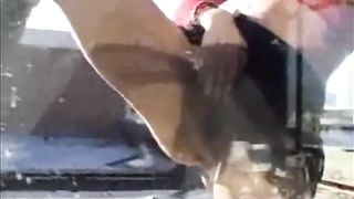 Kinky amateur watersport pissing on the window