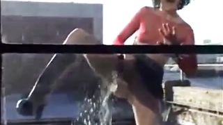 Kinky amateur watersport pissing on the window