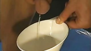 German sluts drinking piss from a tube and box