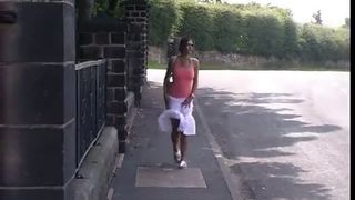 Sexy chick lifting her skirt to piss