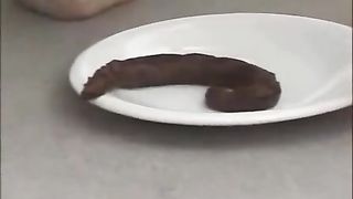 Blond girl pooping on a plate