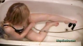 Hot girl shitting in a bath look at her poop
