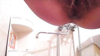 massive log of shit coming out of her butt