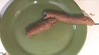 Hot babe shitting on a box with a plate