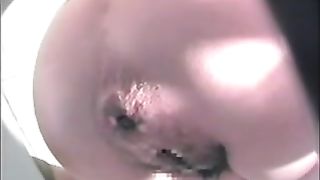 Massive log of shit coming out of her ass in the toilet