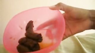 amateur ebony girl pooping in a bucket
