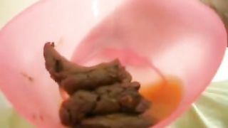 amateur ebony girl pooping in a bucket