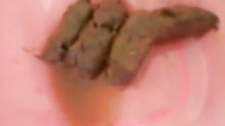 amateur ebony girl pooping in a bucket