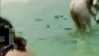 scat girls playing in the sea rubbing poop over their friends