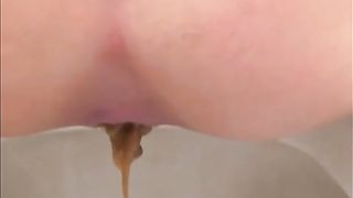 Blonde girl pooping