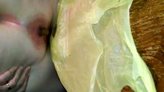 Red shit on a plastic bag