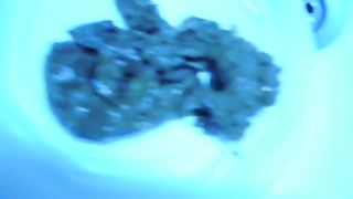 Playing with her poop