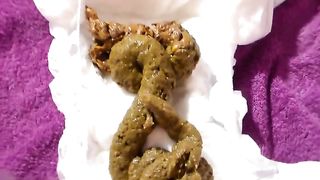 Girl shitting in diaper