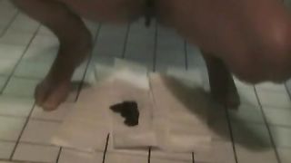 Shit on the bathroom floor