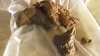 Brunette Asian shitting