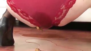 Shit in her red panties