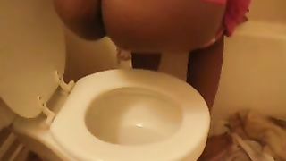 Shit over the toilet