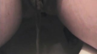 Poop over the toilet