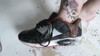 Shit and piss on her sneakers