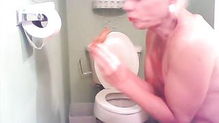 Old granny eating poop