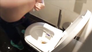 Shitting in the toilet