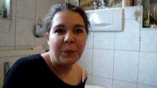 Cleaning her nasty toilet