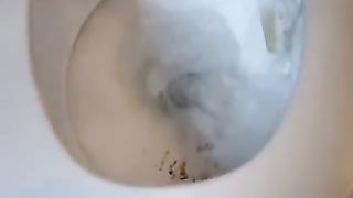 Cleaning her nasty toilet