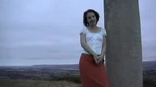 Sexy MILF is pooping outdoor