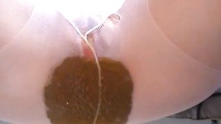 Creamy brown shit in her pantyhose