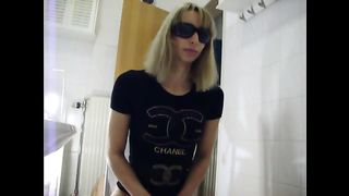 Blonde mistress shitting on her slave
