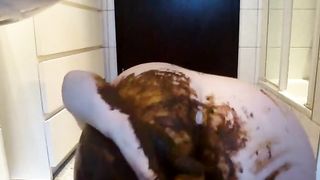 Chubby girl smearing poop while masturbating
