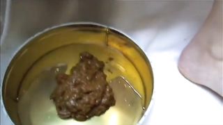 Hot babe shitting in the toilet