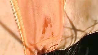 Peeing in her orange panties