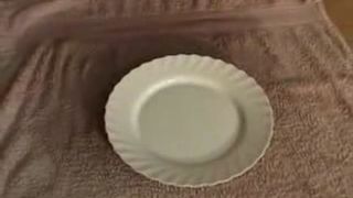 Mature woman shitting on a plate
