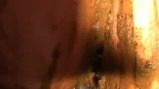 Rubbing shit on her entire body