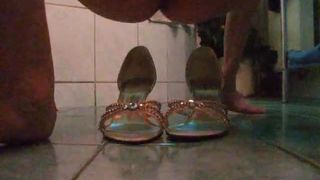 Shit on her sandals