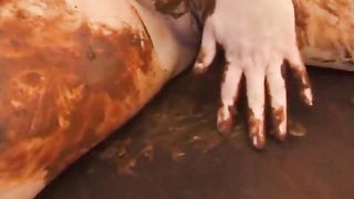 Chubby MILF covered in shit