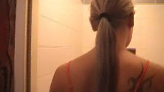 Tattooed girl peeing