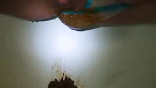 Trying to poop in her lace panties