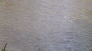 Amateur girl shitting in an open field