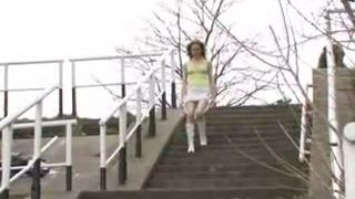 Sexy redhead shitting in a river