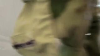 Sexy babe shitting in her shorts