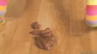 Rubbing shit on her face