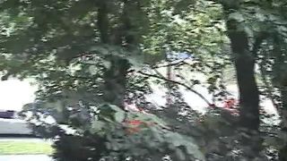 Young woman shitting in a public park