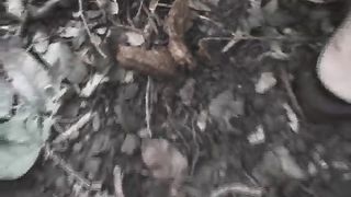 Young woman shitting in a public park