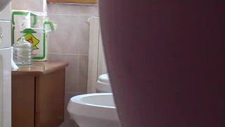 XXX lady shitting in toilet