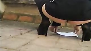 Sexy girl pooping on the roof