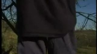 Blonde woman pooping outdoor