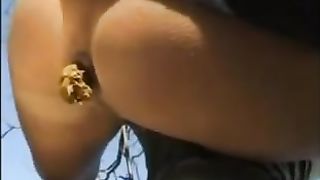Blonde woman pooping outdoor